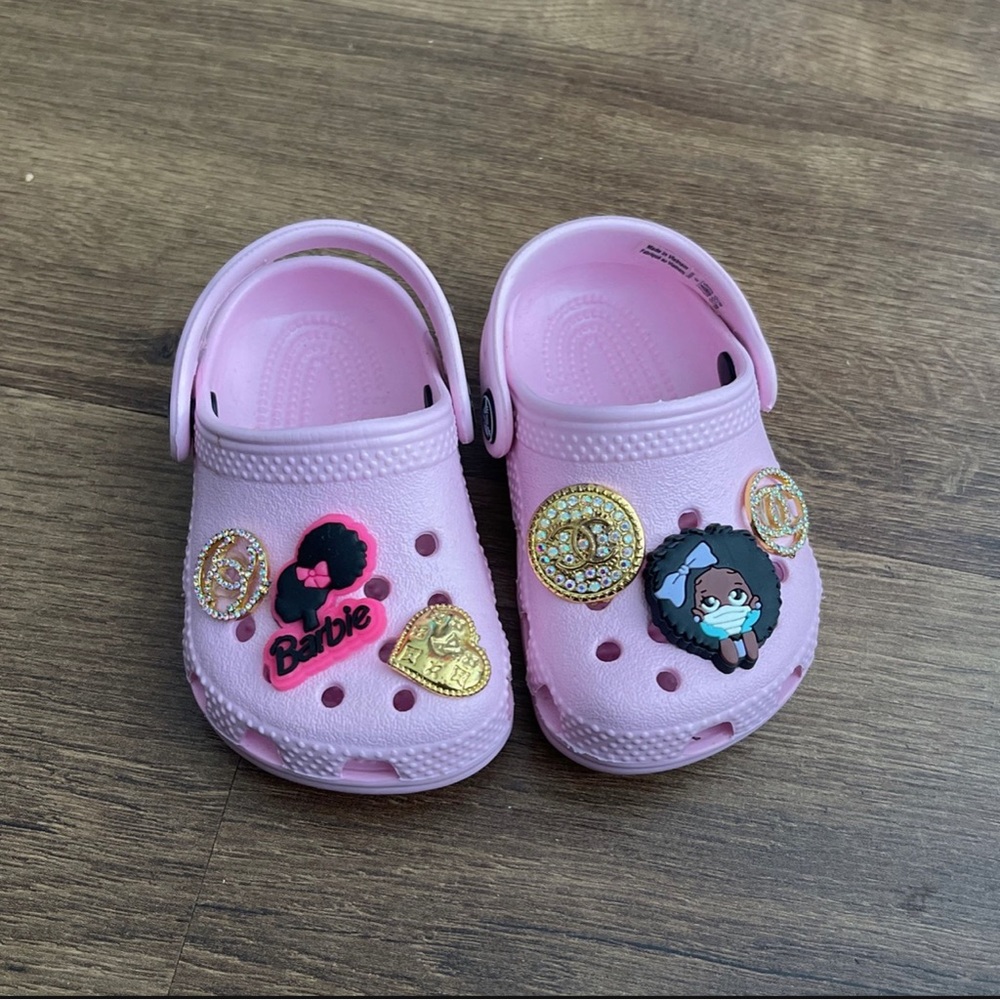 Brand new crocs with charms